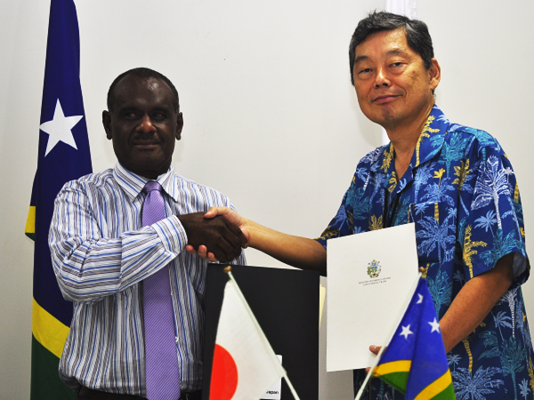 Minister for Foreign Affairs and Exchange Trade Hon Jeremiah Manele exchange note grant with Japanese Ambassador H.E Morimoto Yasuhiro. Photo Lachlan Eddie