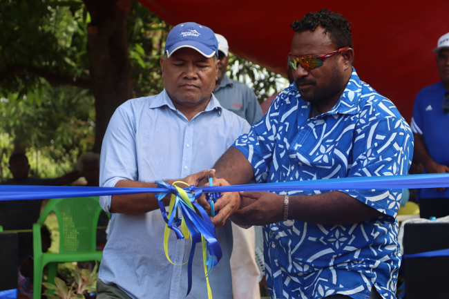 from left, Warren Tamaika PA Rennel & Bellona and Rockson SRM Ghaobata president cutting the ribbon to officially open the Honiara semi-pro league. photo; FLOYD TERRY.