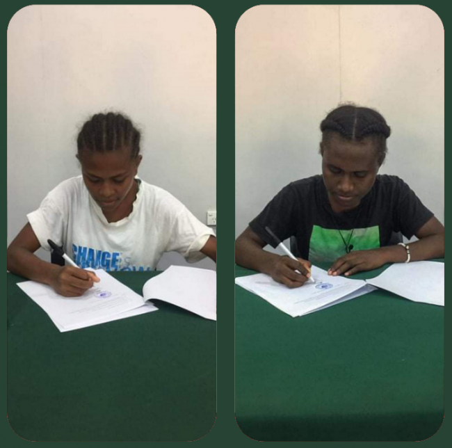 The duo signing their contract-legacy award