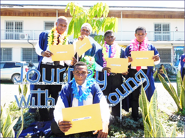 Some of the students with their certificates.