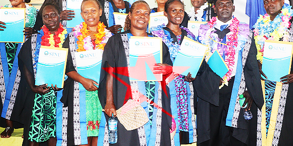Graduands from different faculty of studies as they pose with attainment certificates, Diploma and Bachelor.