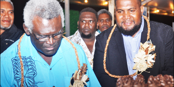 PM Sogavare & SICCI Chairman, Mr. Ricky Fuo’o at a local business booth. PHOTO LACHLAN EDDIE