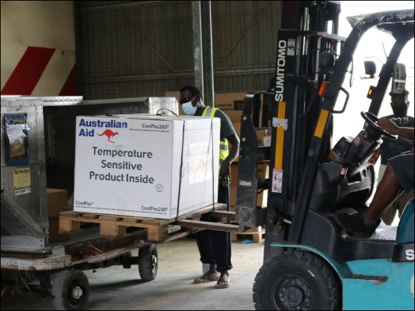 Ministry of Health and Customs officials unloading AstraZeneca vaccines in Honiara last Friday 17th December 2021. Photo supplied.