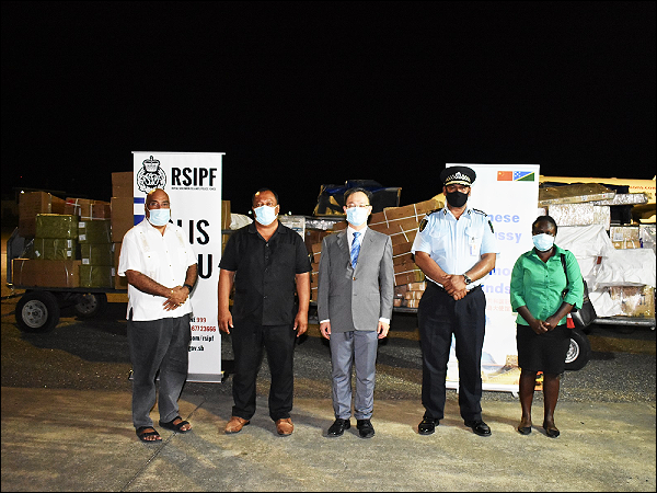 A group photo after the handover ceremony.
