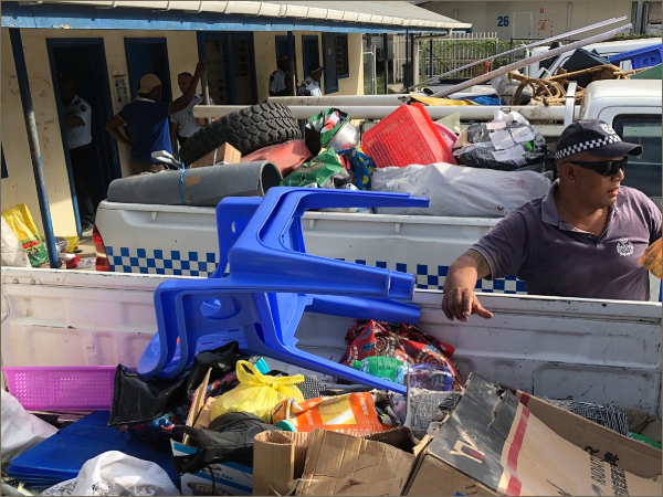 Police vehicles loaded with stolen recovered items at Central Police Station.