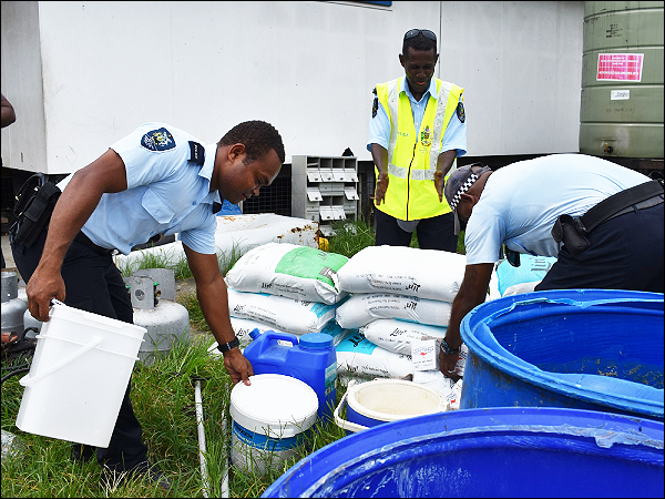 RSIPF Officers sort out raided items for recording purposes