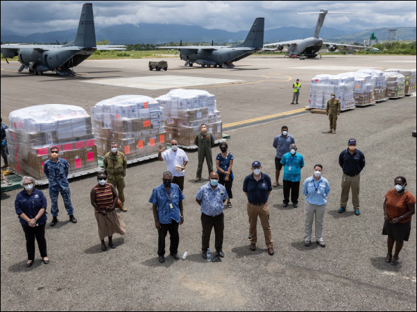 Front row: Deputy High Commissioner, Sally-Anne Vincent, Permanent Secretary of Police, National Security and Correctional Services, Karen Galokale, Secretary to the Prime Minister, Dr Jimmie Rodgers, Minister for Health and Medical Services, Hon. Culwick Togamana, Australian High Commissioner, Dr Lachlan Strahan, AUSMAT lead Bronte Martin, Permanent Secretary of Health and Medical Services, Pauline McNeil. Second and third rows: Wing Commander Stuart Wheal, Lieutenant Colonel Steve Frankel, Permanent Secretary of Foreign Affairs and External Trade, Collin Beck, Dr Elizabeth Rodgers, Jed Abad AUSMAT Liaison Officer, Royal Australian Airforce Squadron Leader Justin Dellabosca and Ministry of Health and Medical Services officials. (Photo: Australian High Commission, SI)