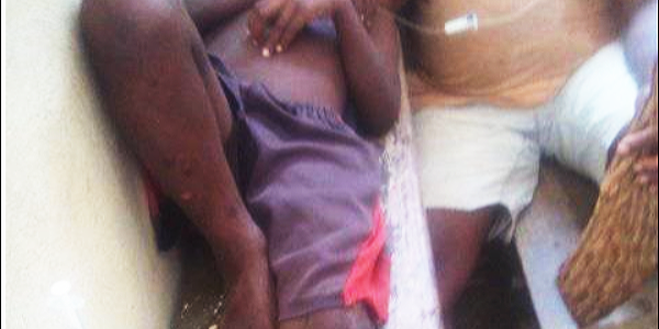 The 9 year-old boy attacked by the croc at the Gupuna clinic awaiting treatment.
