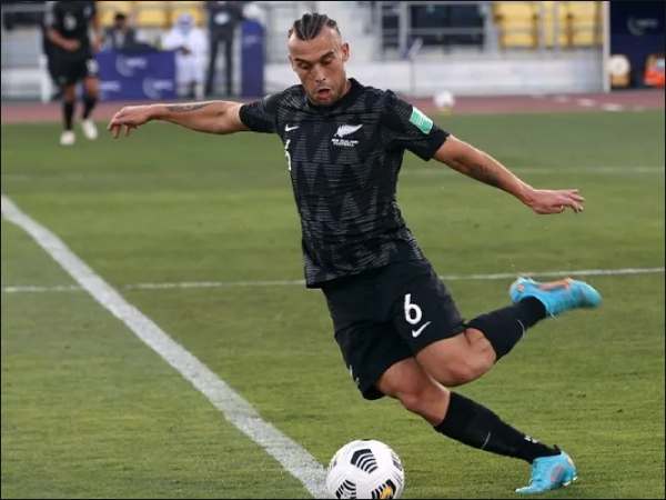 Clayton Lewis kicks the ball during match v Papua New Guinea. Photo Credit: OFC Media.