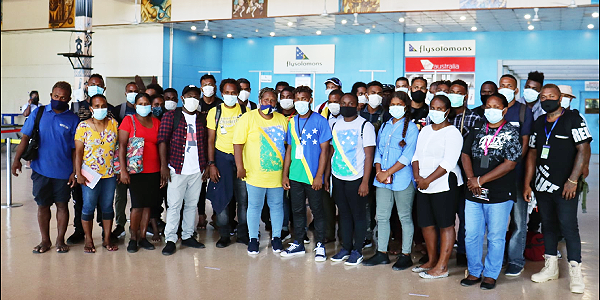 A group of seasonal workers that left for Australia in March of last year. File photo.