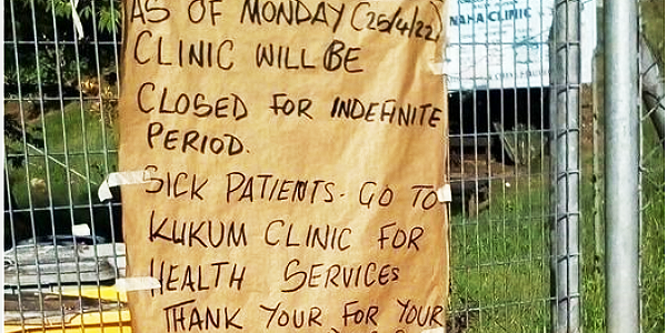 A notice put up on the Naha clinic gate.