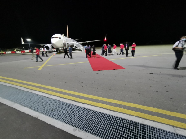 Foreign Minister Wang’s plane landing at Henderson Airport earlier this morning.
