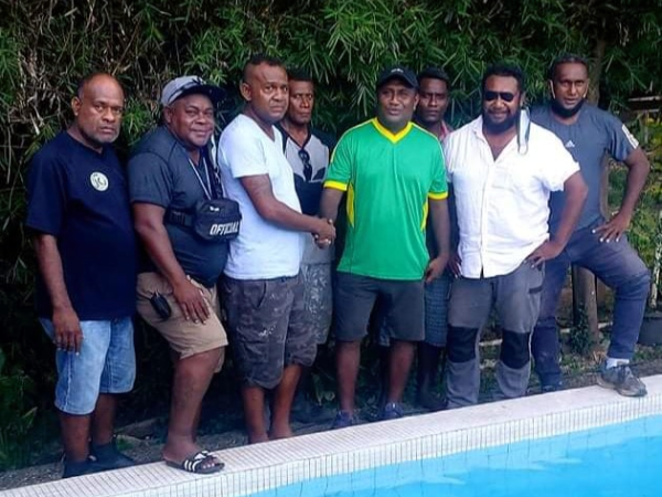 Eddie Marahare being welcomed by members of the KOSSA club.