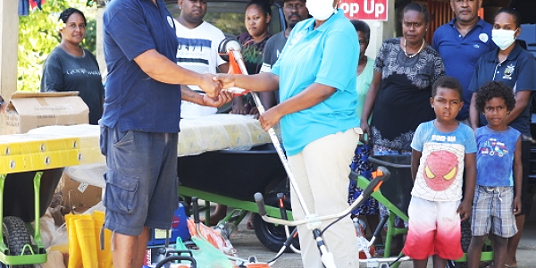 Kaibia Community members receiving the tools from the Ministry of Environment.