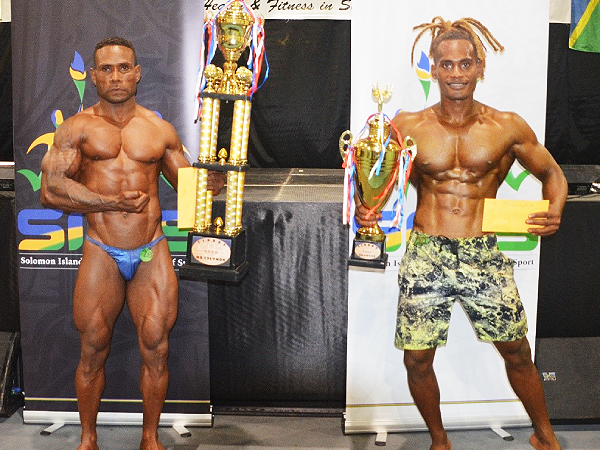2.	2022 SINBBF Bodybuilding Championship overall winners Mr Solomon Is. Bodybuilding Barnabas Waqa and Mr Solomon Is. Physique Junior Billy Oge with their awards. Photo, SINIS.