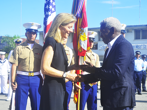 Caroline Kennedy awarding a medallion to John Koloni, son of the Late Aaron Kasa who rescued John F Kennedy. Photo, Lachlan Eddie.