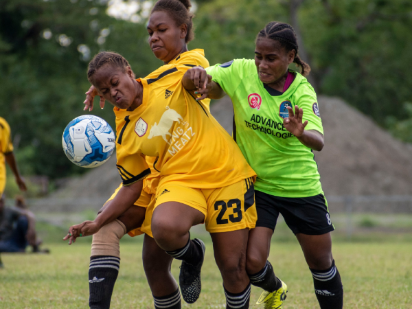 Action between Solright Eels and West Honiara FC.