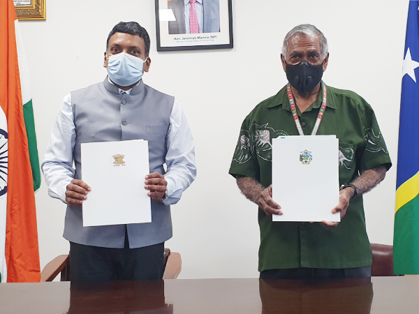 His Excellency Mr Inbasekar Sundaramurthi and the Supervising Permanent Secretary of Foreign Affairs and External Trade Dr. Jimmie Rodgers with the signed the Agreement on Exemption from Visa Requirements for Holders of Diplomatic and Official Passports between India and Solomon Islands. Photo supplied.