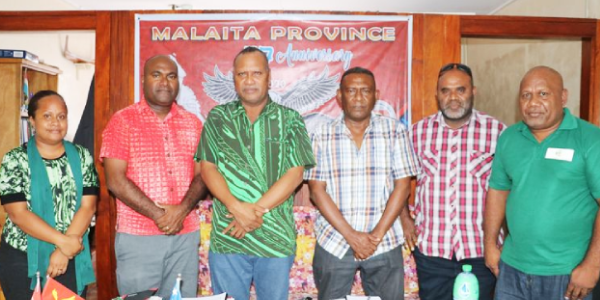 MRD Permanent Secretary Dr. Samson Viulu second from left, next to Malaita Province Premier Daniel Suidani with MRD and Malaita province senior officials. Photo supplied.