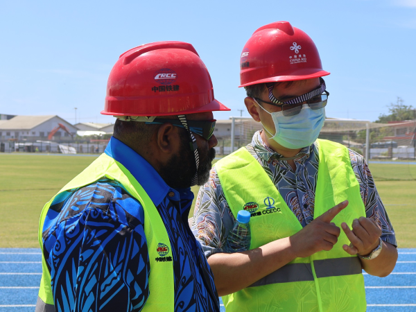 A Chinese official making a point to honorable Waneta