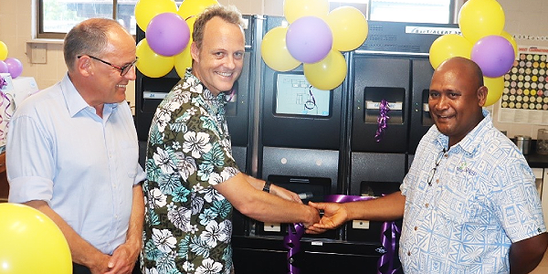 DFAT First Secretary Health Dr. Alex Stephens (centre) officially hands over the lab machines to Health Minister Dr Culwick Togamana and looking on is the DFAT Counsellor for Human Development Mr. Mika Kontiainen.
