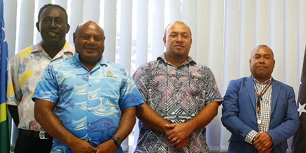Immigration officials with HE William Soaki in Port Moresby. Photo supplied.