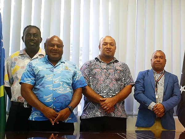 Immigration officials with HE William Soaki in Port Moresby. Photo supplied.