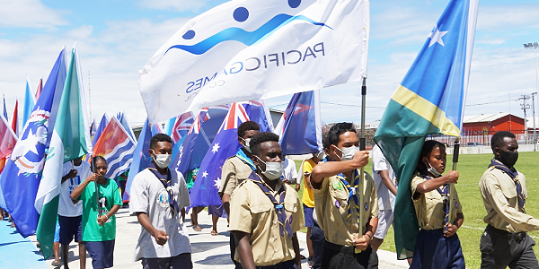 Bearers of the flags of the 24 countries to participate in the 2023 Pacific Games during a procession to officially to mark the “1 YEAR TO GO” before the country hosts the regional games. The procession started at White River and ended at the Solomon Islands National Institute of Sport yesterday. PHOTO: CHARLES KADAMANA.