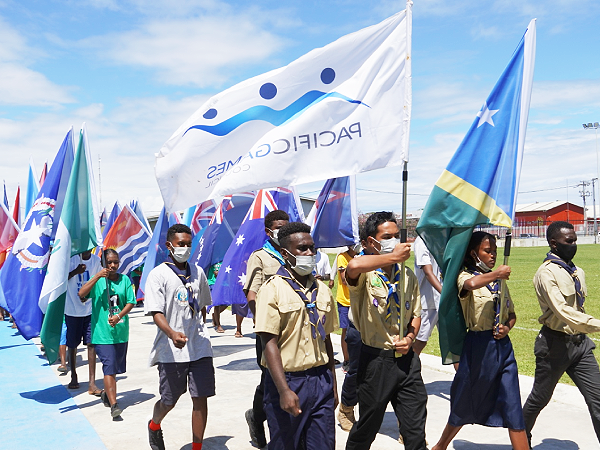 Bearers of the flags of the 24 countries to participate in the 2023 Pacific Games during a procession to officially to mark the “1 YEAR TO GO” before the country hosts the regional games. The procession started at White River and ended at the Solomon Islands National Institute of Sport yesterday. PHOTO: CHARLES KADAMANA.
