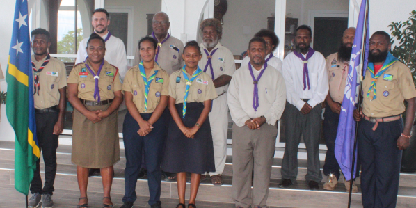 Group photo of the scout members with the four newly appointed members.