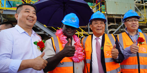 Prime Minister Manasseh Sogavare, second from left and Chair of the Board for GRML and Chair of the Board for Wanguo International Mining Group Mr Gao Mingqing, third, with partners showing a thumbs up during the opening ceremony at Gold Ridge yesterday. PHOTO: CHARLES KADAMANA