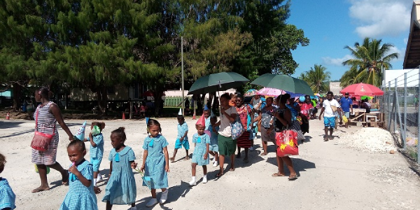 School kids parading through the streets of Gizo.