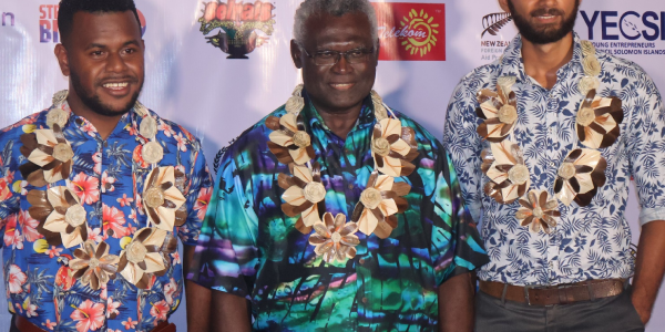 YECSI Coordinator, Maverick Seda and Chairman, John Woperis, with Prime Minister Manasseh Sogavare.