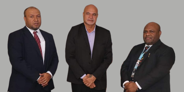 High Commissioner, William Soaki, first from left, with PNG’s Deputy Prime Minister and Acting Minister for Labour and Immigration, John Rosso and Chief Immigration Officer, Stanis Hulahau, at the formal announcement of the VOA reactivation. Photo supplied.