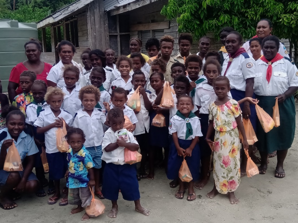 Members of adventurers, pathfinders and their leaders before embarking on an outreach program during the Sabbath.
