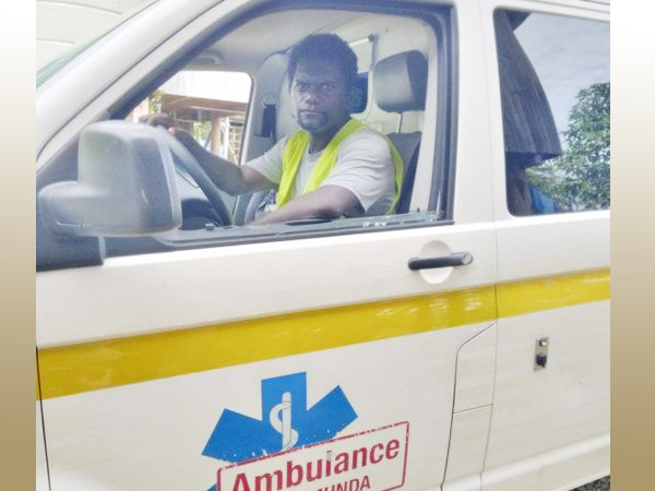 Dr Kuboto Kaniki sits inside the ambulance. Photo Helena Goldie Hospital