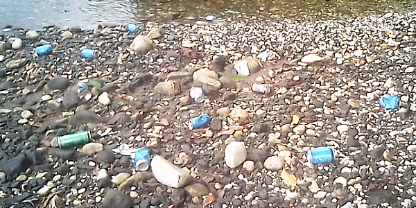 Empty cans of beer dumped along the Kwaiafa river bank in West Kwara’ae, Malaita province.