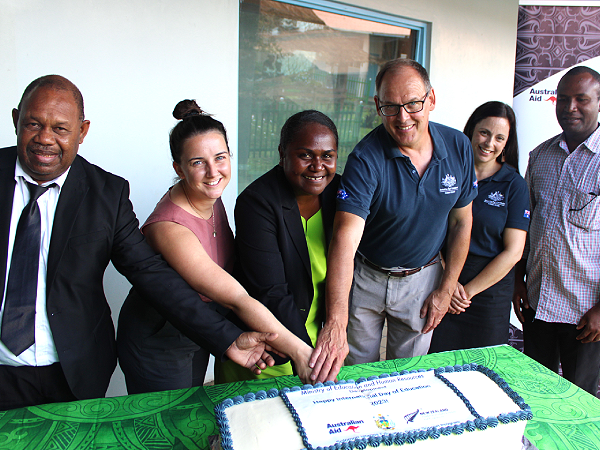 MEHRD ESSP International Day of Education cutting of the cake.