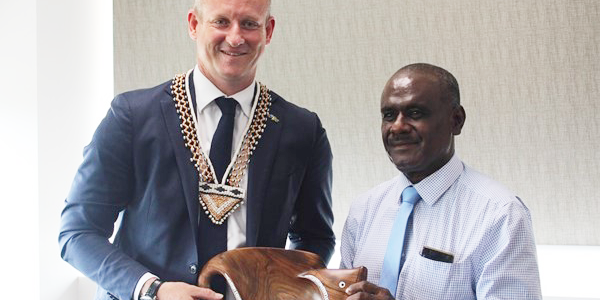 New Australian High Commissioner Designate to the Solomon Islands, His Excellency Rod Hilton receiving a gift from the Minister of Foreign Affairs and External Trade, Hon. Jeremiah Manele.