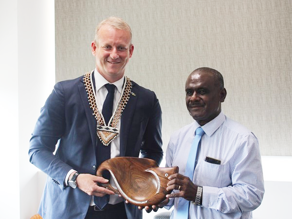 New Australian High Commissioner Designate to the Solomon Islands, His Excellency Rod Hilton receiving a gift from the Minister of Foreign Affairs and External Trade, Hon. Jeremiah Manele.