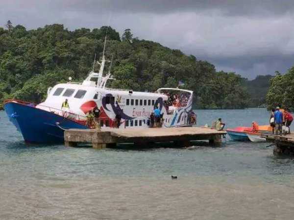 Pelican Express anchoring off the wharf at Afio.
