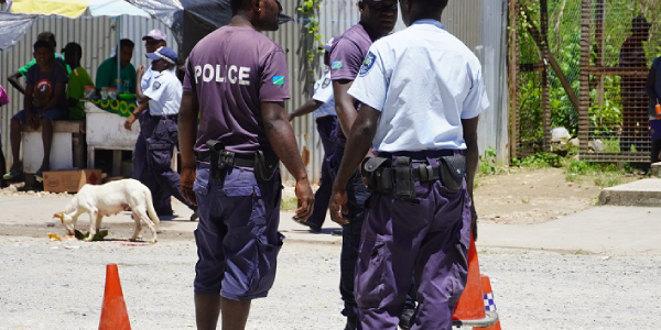 Police Officers in Gizo patrolling the street in Gizo.