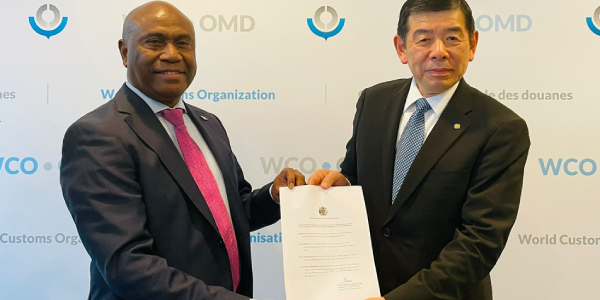 Ambassador H.E Mr Moses K. Mose, and the WCO Secretary-General Dr. Kunio Mikuriya at the symbolic handing-over ceremony of Solomon Islands instrument of accession, at the WCO Headquarters in Brussels.