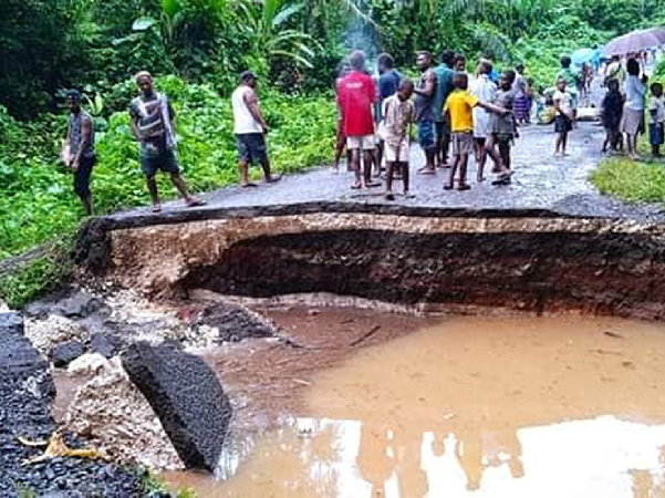 Part of road at Anonakinaki cut off by flooding water earlier this week. Photo by Clement Wane.