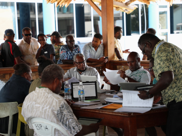 Central Tender Board (CTB) Chairman McKinnie Dentana who is also the Permanent Secretary of the Ministry of Finance & Treasury (MoFT) and the CTB Committee members during the public opening of tenders last Thursday in the presence of reps from bidding companies and MRD at the MoFT leaf hut.