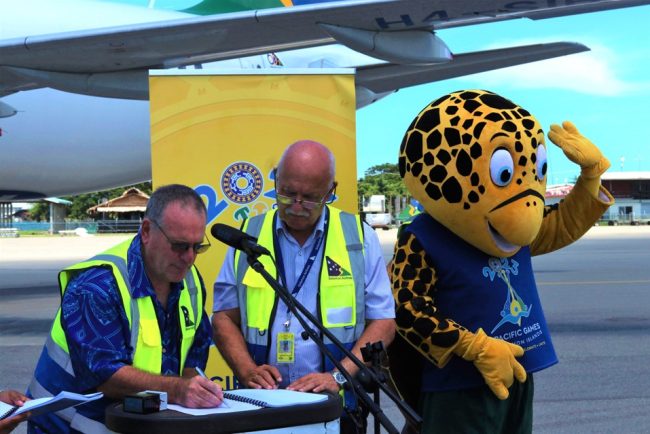 (L2R) Pacific Games Organising Committee CEO, Mr. Peter Stewart, Solomon Airlines CEO Mr Gus Kraus and Solo the mascot, at the contract signing.