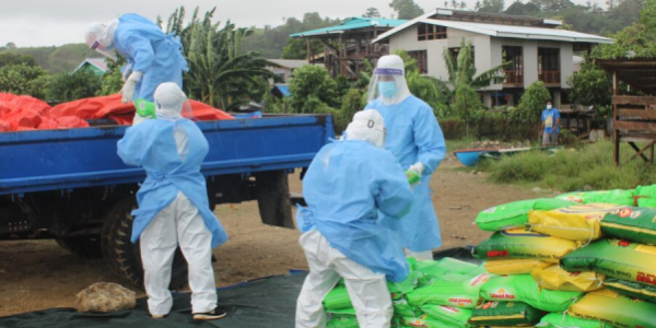 The Livelihood distribution unloading food stock to local communities during the height of the Covid-19 pandemic in January of 2022.
