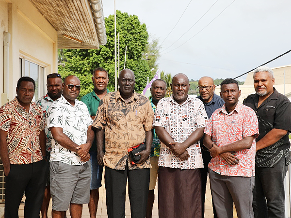 (L-R, front row) Tommy Mana from OPMC, Permanent Secretary for the Ministry of Rural Development Dr Samson Viulu, Hon. Premier Billy Veo, Hon. Deputy Premier and Minister for Finance and Treasury Carlrick Runimetu and Policy Secretary Resource Sector from OPMC Jimson Tanangada. Back row: MRD Director of Rural Development Division Milfred Delemani, MRD Director of Governance Hickson George, MRD Deputy Secretary Technical Hugo Hebala, Deputy Provincial Secretary for Western Province Patrick Toiraena and SSPM Albert Kabui. Photo, MRD.