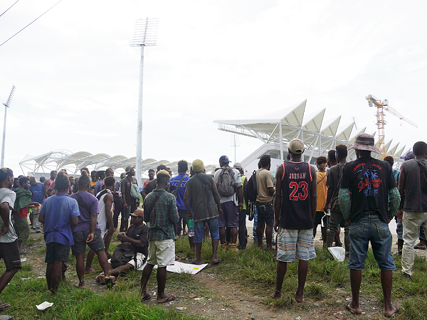 Pacific Games workers at the main stadium during Tuesday’s peaceful strike.