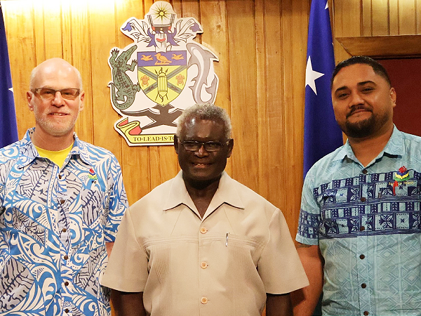 Prime Minister Sogavare, centre, with Mr Casagrande, first from left, and a SPBD employee. Photo by PM’s Press Secretariat
